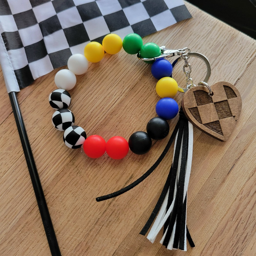 Racing flag silicone bead wristlet key ring.