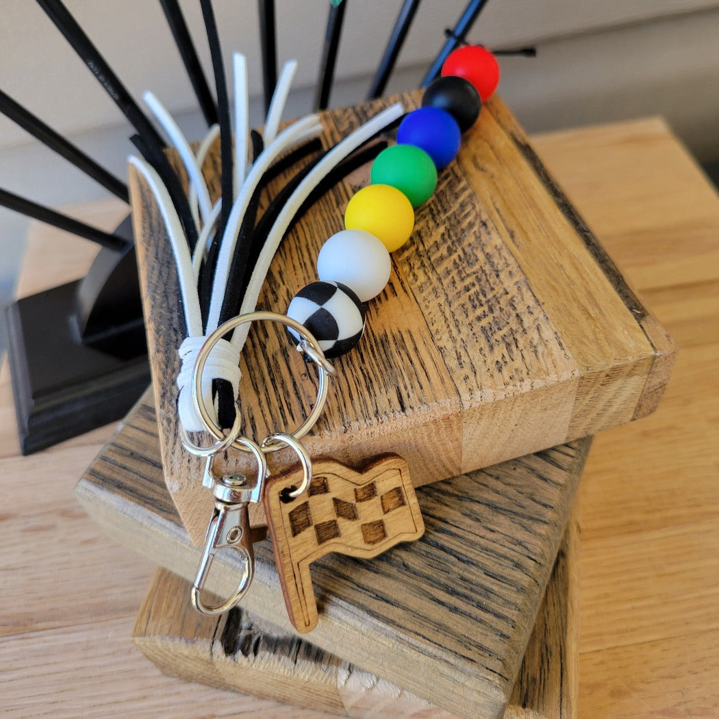 Racing flag silicone bead key ring.