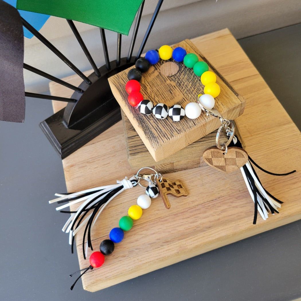 Racing flag silicone bead wristlet and key ring.