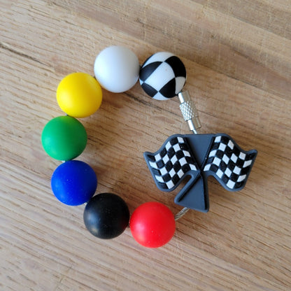 Silicone bead tumbler charm.