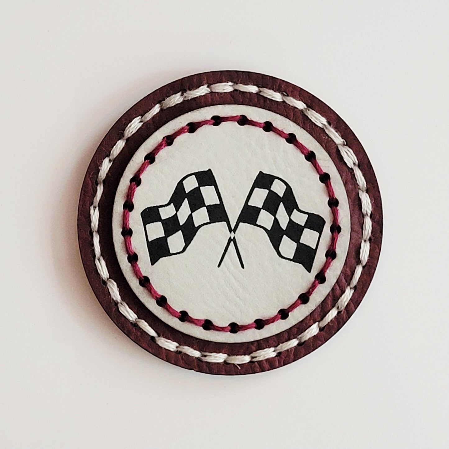 Crossed Checkered Flags Round Hand-Stitched Magnet