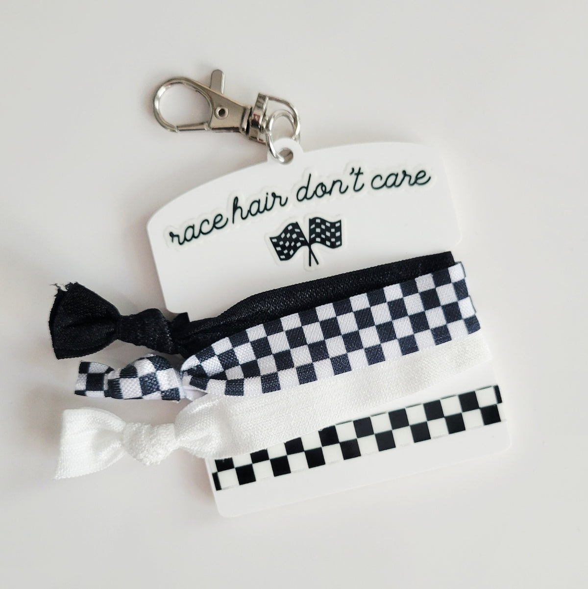 Race Hair Don't Care Clip On Hair Tie Holder