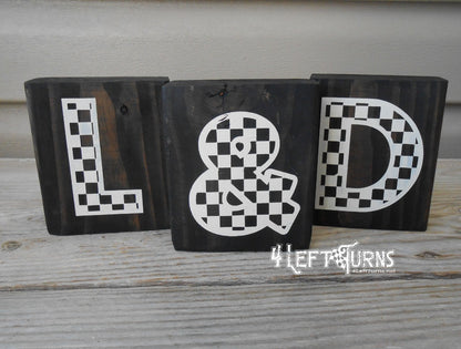 Blocks of wood with painted on decoration.